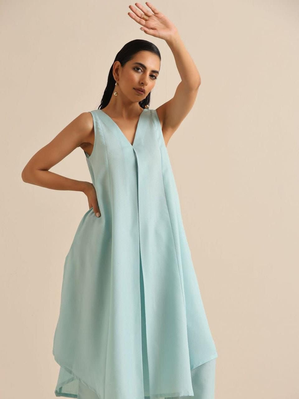 Sleeveless Asymmetric Kurta & Straight Pants Set – Minimalist Statement Wear