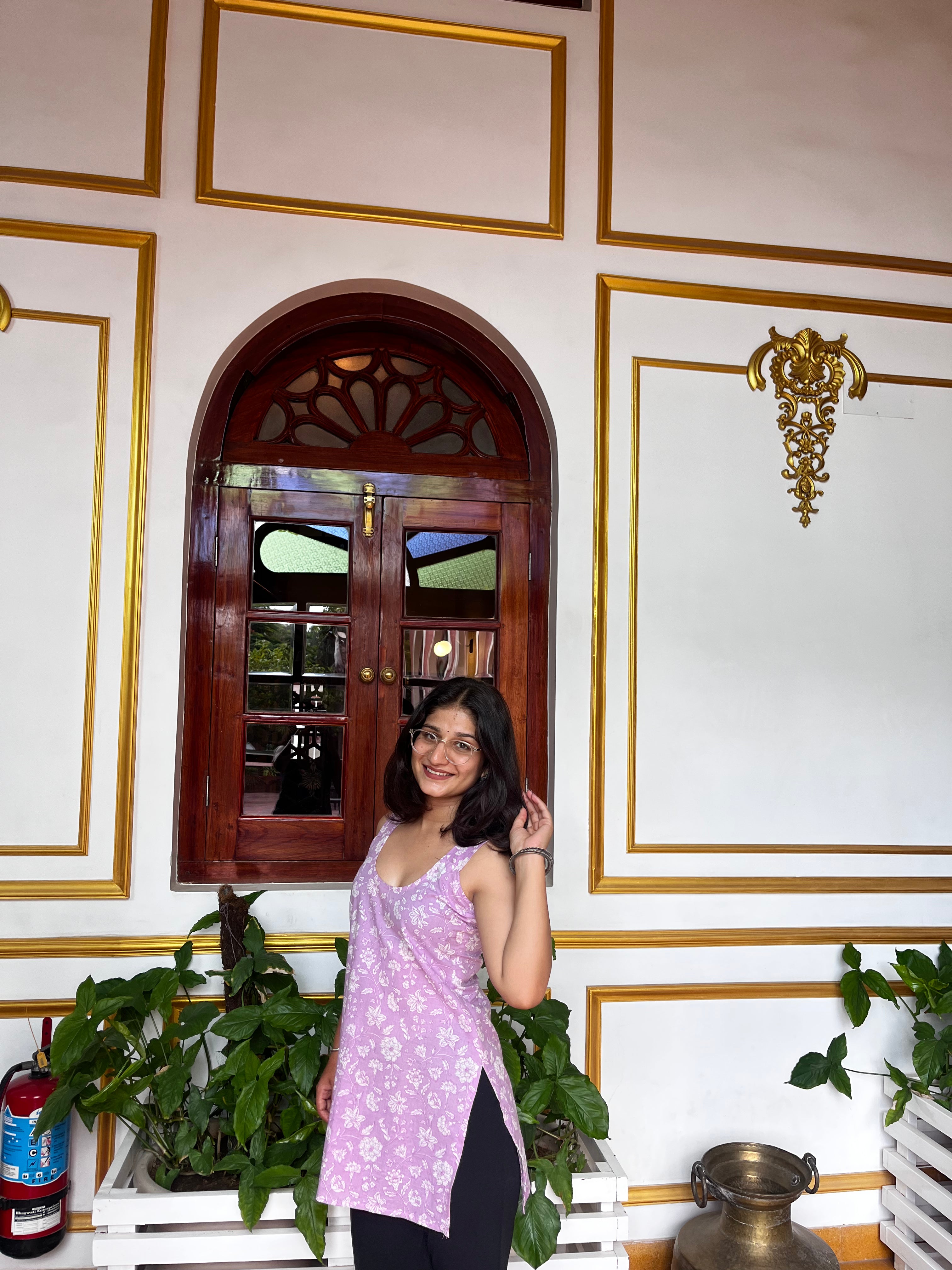 Lavender Floral Sleeveless Kurti with Back Tassel Detailing