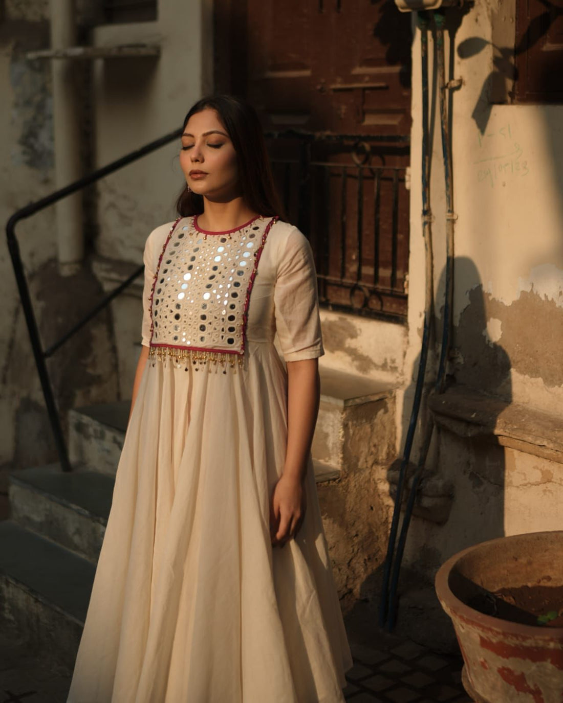 Cream Anarkali Kurta Set with Mirror Work Embroidered Yoke & Red Pants
